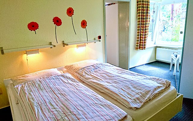 Ferienhaus: Schlafzimmer mit Doppelbett